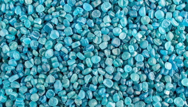 Close-up view of many small, smooth, blue stones