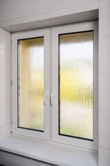 Modern PVC window frame in a residential interior space for energy efficiency
