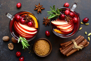 Delicious mulled wine with ingredients for making. Top view with copy space.