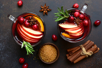 Delicious mulled wine with ingredients for making. Top view with copy space.