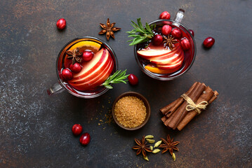 Delicious mulled wine with ingredients for making. Top view with copy space.