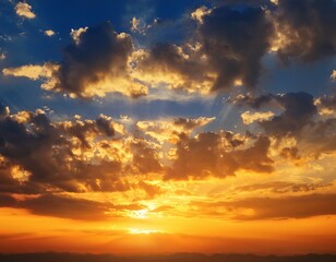 Fototapeta premium beautiful vivid sky painted by the sun leaving bright golden shades