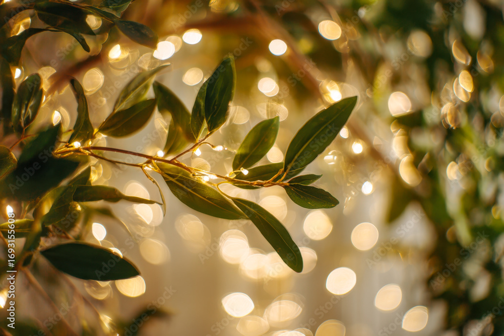 Poster close-up of green leaves entwined with delicate warm fairy lights creating a magical and cozy atmosp