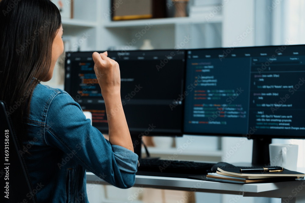 Poster young asian it developer creating raising fist up with successful information on pc with coding prog