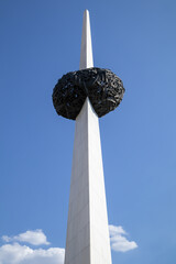 public space the monumental rebirth memorial in bucharest, a striking modern sculpture with a...