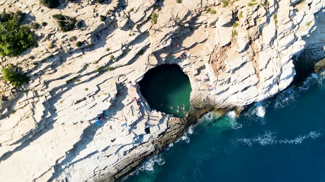 Giola lagoon in Thassos Island, Greece.  One of the most place in Thassos. Amazing sea with clear blue water. Aerial panoramic drone view from above, top view from drone. Summer holidays Europe

