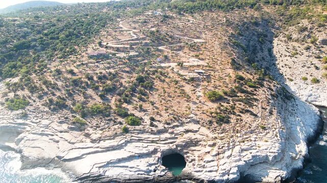 Giola lagoon in Thassos Island, Greece.  One of the most place in Thassos. Amazing sea with clear blue water. Aerial panoramic drone view from above, top view from drone. Summer holidays Europe
