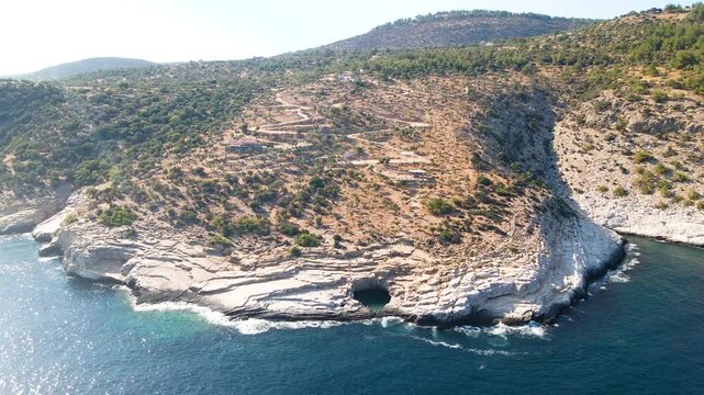 Giola lagoon in Thassos Island, Greece.  One of the most place in Thassos. Amazing sea with clear blue water. Aerial panoramic drone view from above, top view from drone. Summer holidays Europe
