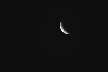 Close-up of the moon during a lunar eclipse against a dark night sky.
