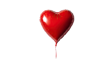 Heart-shaped red balloon against black