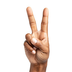 Close-up of a hand making a peace sign. Dark-skinned hand, two fingers extended, showing the V-sign, against a black background