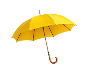A bright yellow umbrella against a black background.  Water droplets appear on the surface
