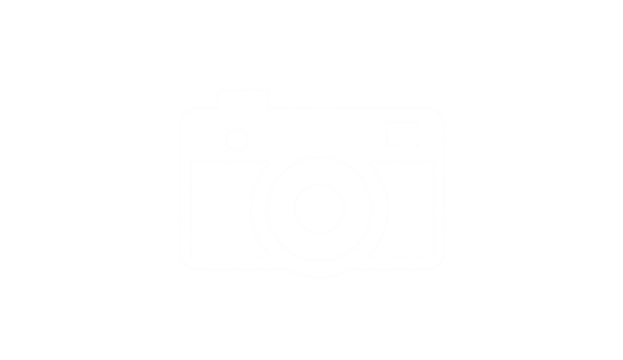 Simple, pixelated white camera icon on black background