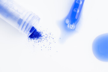 Close up of Blue Copper Peptides in Powder and Liquid Form