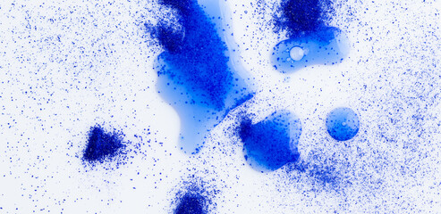 Close up of Blue Copper Peptides in Powder and Liquid Form