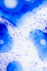 Close up of Blue Copper Peptides in Powder and Liquid Form