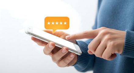 A person uses a smartphone, tapping on the screen to rate with five stars.