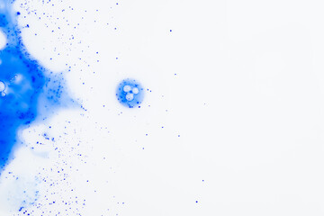 Close up of Blue Copper Peptides in Powder and Liquid Form