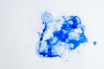 Close up of Blue Copper Peptides in Powder and Liquid Form