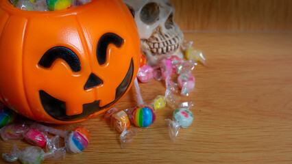 The Halloween bucket and candy for holiday concept