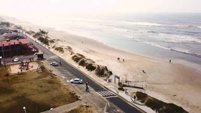 Aerial drone footage of Cap&atilde;o da Canoa skyline and coastline, Rio Grande do Sul, Brazil
