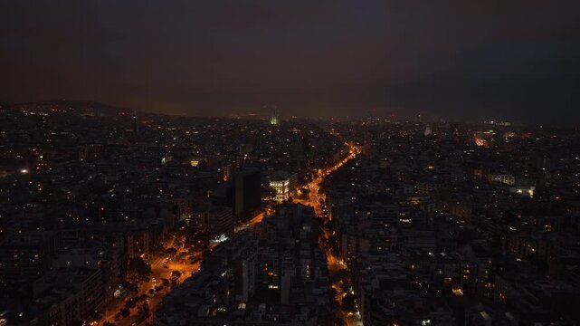 night time illumination barcelona city traffic streets aerial panorama 4k spain