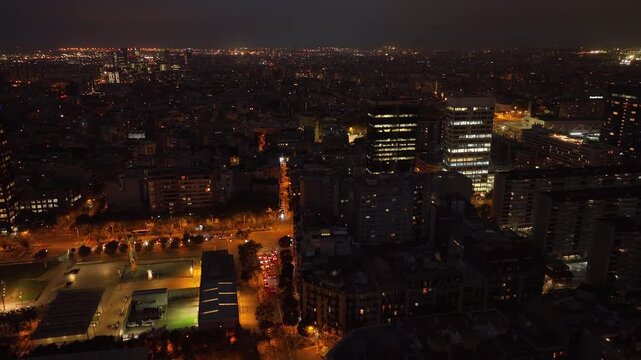 night time illumination barcelona city traffic streets aerial panorama 4k spain