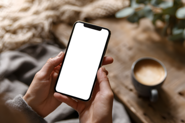 Person holding smartphone with blank screen, ideal for app mockups or digital content display