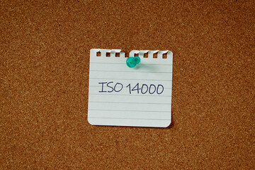 There is a piece of paper with the word ISO 14000. It is as an eye-catching image.