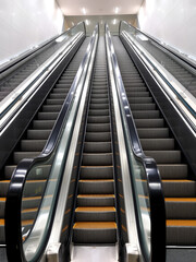Conceptual view of escalators symbolizing smooth progress
