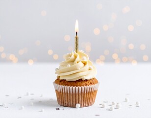 Festive single cupcake, golden candle, soft bokeh, sweet celebration moment.