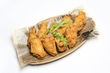 Crispy Korean Fried Chicken Wings with Spicy Sauce – Authentic Asian Cuisine, Popular Street Food and Delicious Snack Dish Close-up