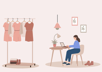 A woman works from her home office on a laptop, likely running a fashion business or blog, with a clothing rack nearby