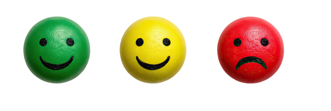 Three emoji spheres?green happy, yellow happy, and red sad
