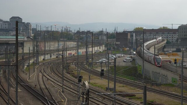 sunny day zurich city industrial district central railroad traffic bridge top panorama 4k switzerland
