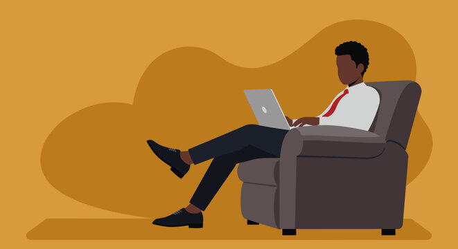 Professional man works on a laptop from a comfortable armchair, highlighting remote productivity and modern business lifestyle.