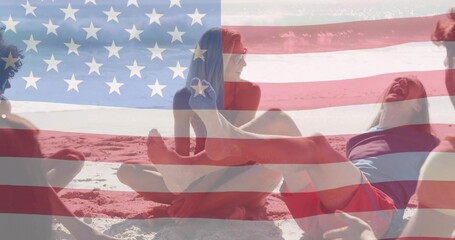 Displaying five friends wearing swimsuits, sunglasses and board shorts on beach with flag overlay