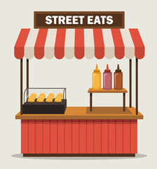 This street food stall with its vivid striped canopy presents an assortment of delicious offerings, capturing the essence of outdoor dining and vibrant culinary experiences.