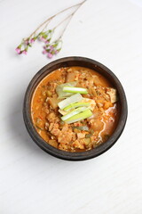 Traditional Korean Cheonggukjang Fermented Soybean Stew in Hot Pot – Authentic Asian Cuisine, Healthy Probiotic Soup Dish Close-up