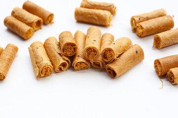 Rolled crispy wafers filled with shredded pork floss, Thai snack.
