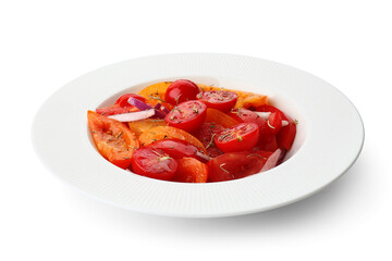 Plate of fresh tomato salad with red onion on white background