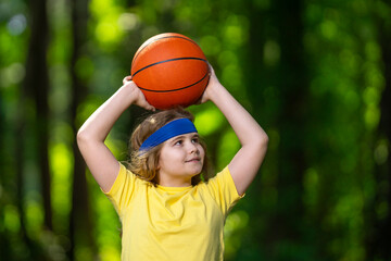 Teen kid practicing fitness outside. Cute little boy doing fitness on nature. Young sporty kid...