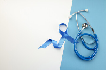 Blue ribbon for prostate cancer awareness by stethoscope