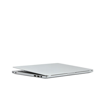 Modern silver laptop computer closed and lying flat on a clean white surface isolated on transparent background