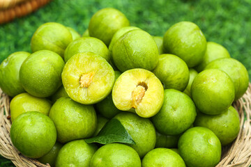 Fresh Sichuan Plums Boned and Placed in Wicker Basket - Healthy Organic Chinese Stone Fruit