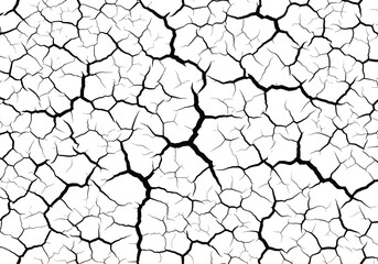 Abstract pattern of dry cracked earth texture in black and white monochrome close up