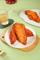 Crispy Spiced Chicken Wings Gourmet Food Photography with Elegant Table Setting