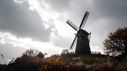 Historic windmill on hilltop
