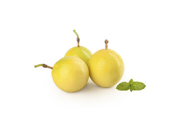 Fresh Golden Yellow Plums with Mint on White Background - Organic Stone Fruit