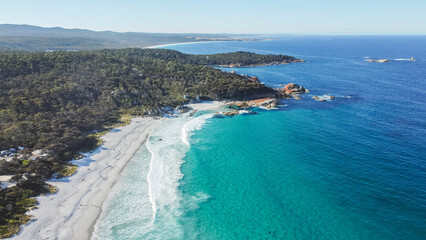 The Bay of Fires is a bay on the northeastern coast of Tasmania in Australia, extending from Binalong Bay to Eddystone Point. 